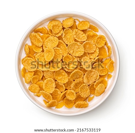 Corn flakes with milk isolated on white, top view Royalty-Free Stock Photo #2167533119