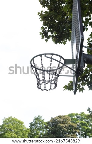 Basketball basket on the outdoor basketball field in the park
