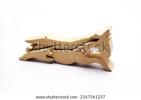 wooden animal toys on white background