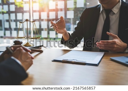 counseling lawyer business lawyers working about legal legislation in the courtroom to help their customer Royalty-Free Stock Photo #2167565857