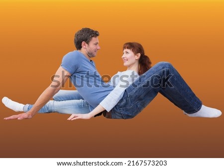 Caucasian couple looking at each other while sitting against copy space on yellow background. valentine's day and love concept