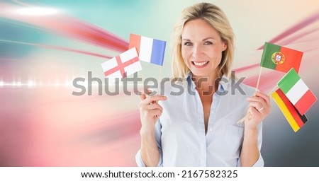 Caucasian woman holding multiple flags against digital waves on pink background with copy space. national tourism concept