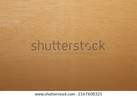 Brown background with soft wood texture. Perfect for use as a presentation slide background.