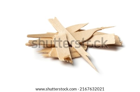 Broken wooden forks and knives isolated. Eco tableware, disposable cutlery, wood biodegradable fork, knife, bamboo table setting for picnic, recycle reusable utensil on white background Royalty-Free Stock Photo #2167632021