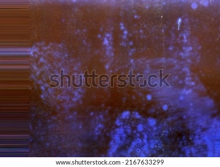 Dusty scratched and scanned old film texture Royalty-Free Stock Photo #2167633299