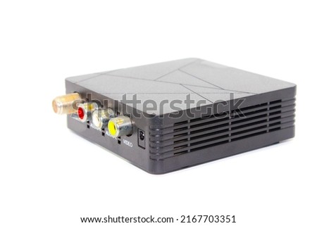 A picture of digital set up box for tv on white background with selective focus