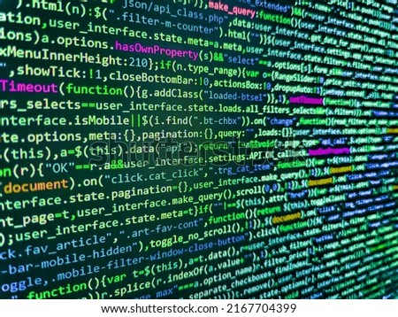 WWW software development. Programmer Typing New Lines of HTML Code. Website development. Simple website HTML code with colorful tags in browser view on dark background