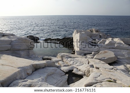 Aegean seashore and marble rocks in Aliki, Thassos island, Greece 