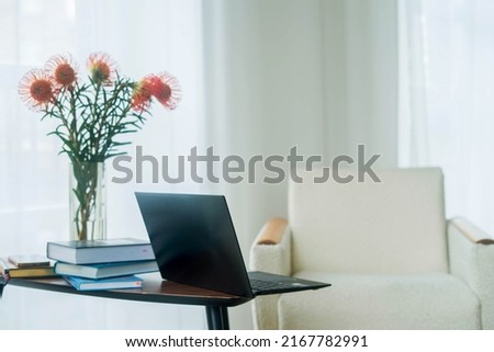 Picture of modern personal computer with blank white copy space screen. Mock up of workplace. High quality photo