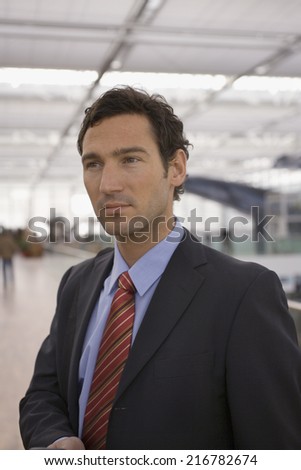 A businessman at an airport.