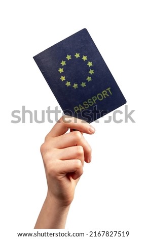 Woman hand showing passport isolated on white background. Tourism, going abroad concept. Identity, nationality verification. High quality photo Royalty-Free Stock Photo #2167827519