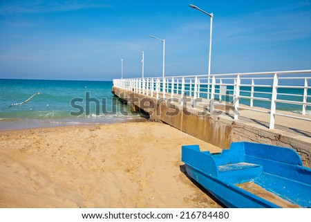 Sandy beach and pier 