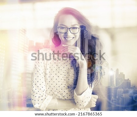 Ready for whatever this new city has to offer. Portrait of an attractive young woman superimposed over a cityscape. Royalty-Free Stock Photo #2167865365