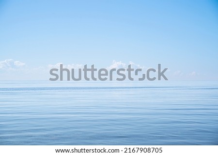 Calm Sea Ocean And Blue Sky Background. High quality photo