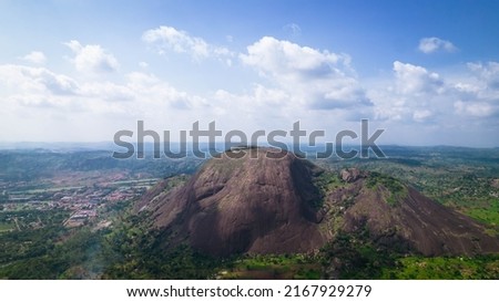 wide aerial drone shot of Aso Rock in the federal capital territory of Nigeria Royalty-Free Stock Photo #2167929279