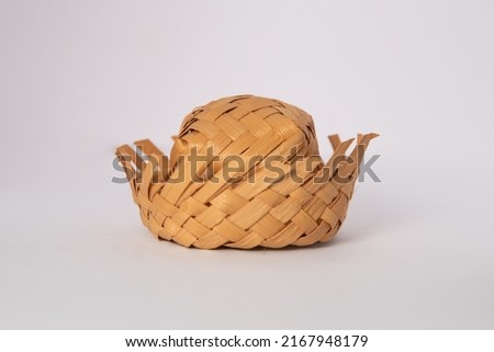 Straw hat on a white background. Traditional object used in the June festivities in Brazil. Known as "chapéu de palha" Royalty-Free Stock Photo #2167948179