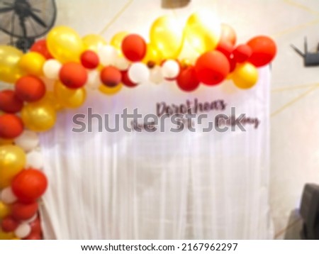 Defocused abstract background of a birthday balloon decoration