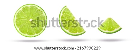 Flying lime slices collection isolated on white background. Clipping part. Royalty-Free Stock Photo #2167990229
