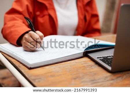 Putting in long hours for my future. Shot of an unrecognizable student studying at college. Royalty-Free Stock Photo #2167991393