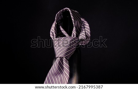 Tied necktie. Fashion necktie Business tie. Windsor knot. Formal neckwear. Mens accessory Royalty-Free Stock Photo #2167995387