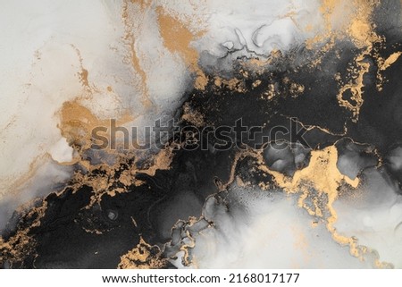 Marble ink abstract art from exquisite original painting for abstract background . Painting was painted on high quality paper texture to create smooth marble background pattern of ombre alcohol ink . Royalty-Free Stock Photo #2168017177