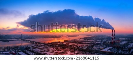 Greenhouse gas emissions. Pollution of factories. Dirty air over the city. Negative impact on human health Royalty-Free Stock Photo #2168041115
