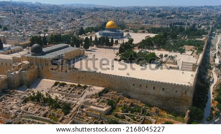 Ancient Old city dome of the rock mosque, aerial view

Beautiful drone shot from Old city of Jerusalem al Aqsa Mosque, June, 2022
 Royalty-Free Stock Photo #2168045227