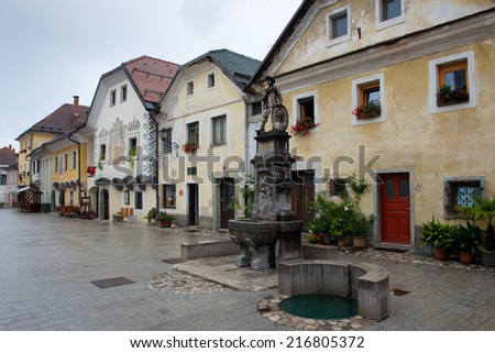 Ancient houses in the main square of Radovljica in Slovenia Royalty-Free Stock Photo #216805372