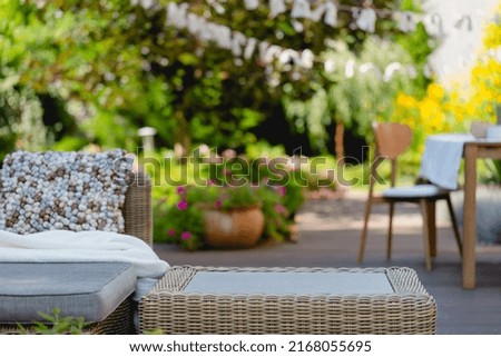 Rattan coffee table and sofa in the garden living room
