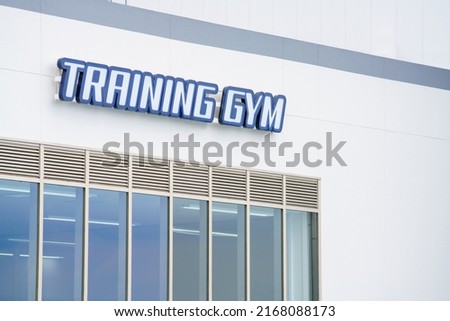 The blue sign of the training gym.