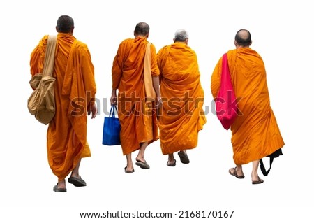 Buddhist monks walking isolated. back view of walking people. Royalty-Free Stock Photo #2168170167