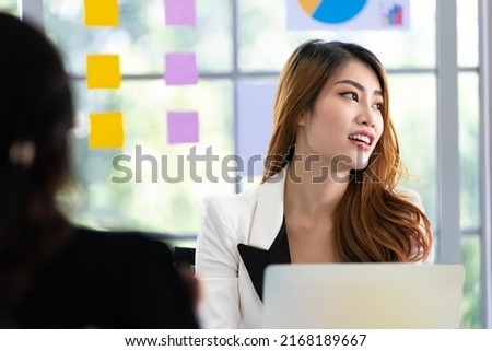 Asian business woman Doing like at the company's office