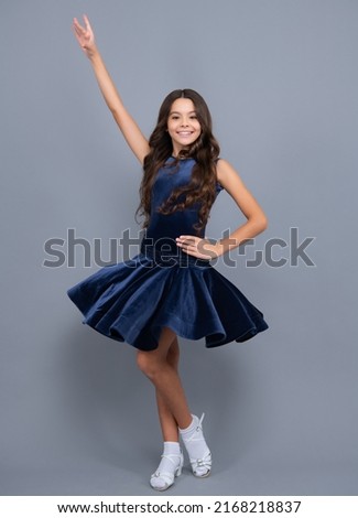 Dance school, teenager child ballroom dancer. Teen girl in ballroom dancer wear dress in dance pose.