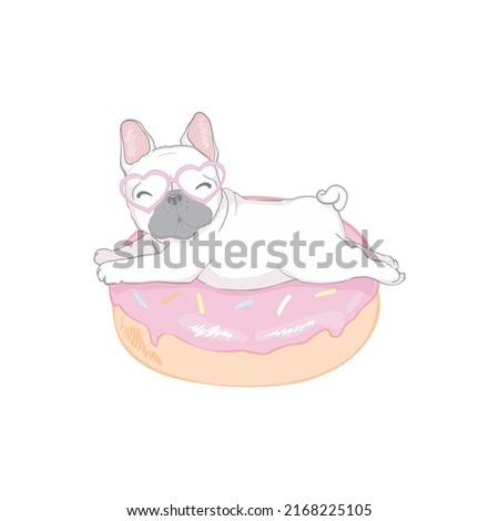 Cute bulldog and a donut on an isolated white background.