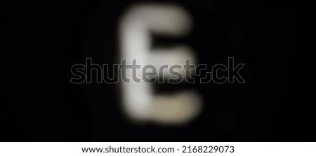 white english characters blur black background