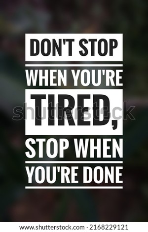 Inspirational Motivational Quotes. Don't stop when you're tired, stop when you're done in blurred background
