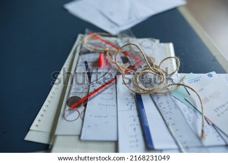 collection of office supplies, pencils, paper, pens, and work. text : Lorem Ipsum