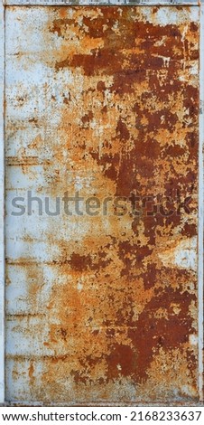 A sheet of painted metal with peeling gray paint and rough patches of rust. Vertical image.
