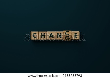Wooden blocks with the word CHANGE changing the letter G to C so that the word CHANCE appears. Royalty-Free Stock Photo #2168286793