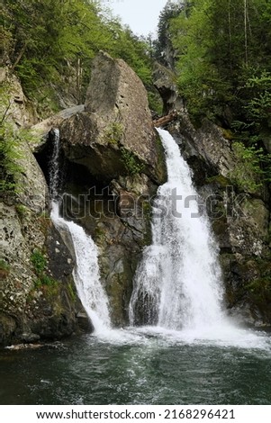 Close up of the amazing BashBish Falls as the water thunders down the mountain Royalty-Free Stock Photo #2168296421