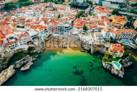 Drone aerial view of Praia da Rainha and historic city centre of Cascais, Portugal Royalty-Free Stock Photo #2168307015
