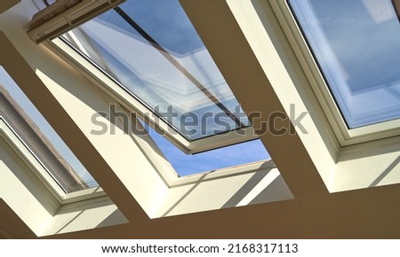 Modern roof skylight window example                        Royalty-Free Stock Photo #2168317113