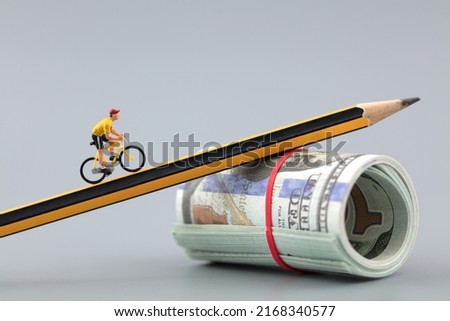 Miniature creative dollar pencil and riding money