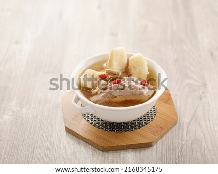 Double-boiled Spare Rib Soup with Chinese Yam and Snow Pear with chopsticks served in a dish isolated on mat side view on grey background Royalty-Free Stock Photo #2168345175