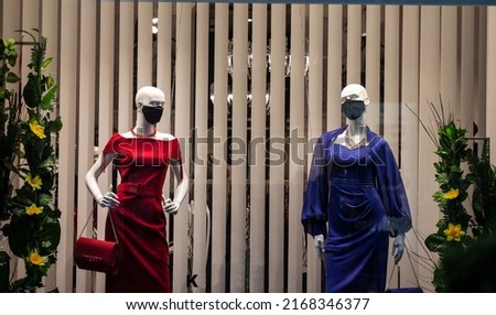 Selective blur on two fashion dummies in a closed clothing fashion retailer store wearing respiratory face mask covering in Belgrade, Serbia, during Coronavirus Covid 19 health crisis.

 Royalty-Free Stock Photo #2168346377