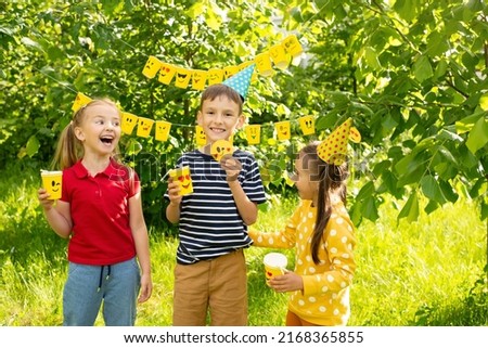 World Smile Day and World Emoji Day, a holiday, children have fun playing and laughing, first love and friendship, eyes with hearts, happy holidays in summer. Children's birthday 