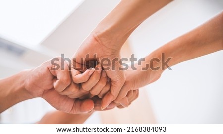 Fist bump collide agreement of two businessman, show strength teamwork, handshake negotiations finish together after good deal, congratulations on success. Royalty-Free Stock Photo #2168384093