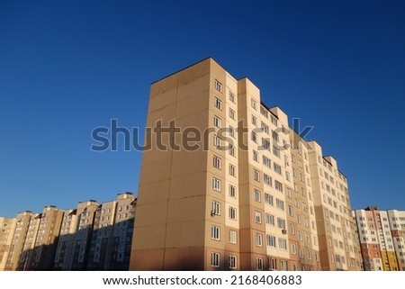 Block of flats, cheap residential building. Architecture and concept background                                      