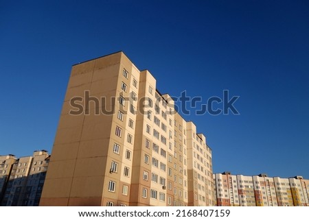 Block of flats, cheap residential building. Architecture and concept background                                      