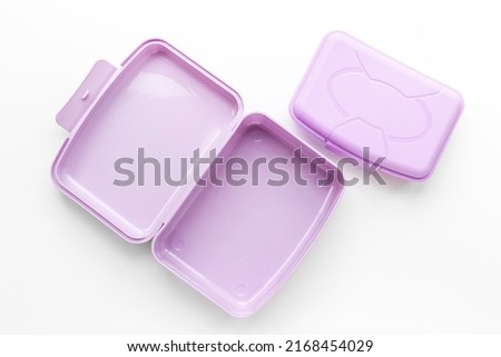 Empty purple lunch boxes, top view. Plastic container for food Royalty-Free Stock Photo #2168454029